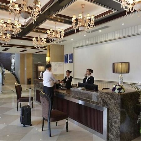 Wenhua Herton Hotel Qionghai Esterno foto